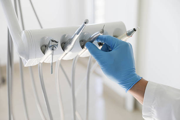 Professional Tooth Extraction technician working in North Alamo, TX